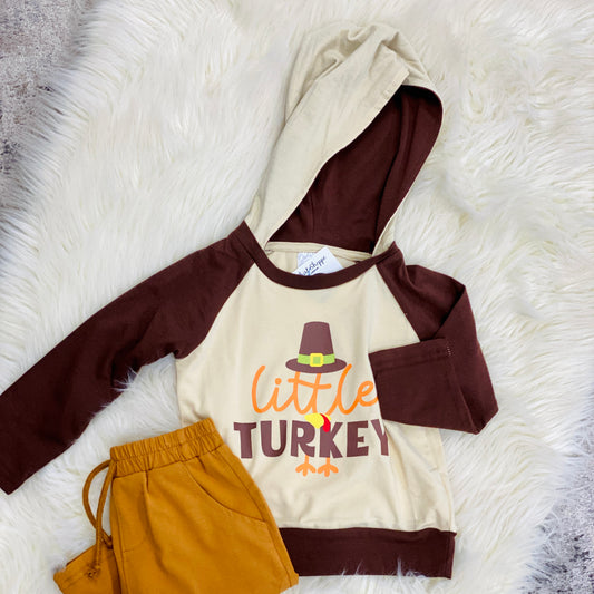Dress your little turkey in this adorable printed hoodie. Features a full-color turkey and a cuffed hem. Perfect for class parties and Thanksgiving festivities. pullover hooded cuffed hem 95% Polyester, 5% Spandex Return Policy:  1-14 Day Return for cash back, 14-30 Day Return for in-store credit, no returns after 30 days.