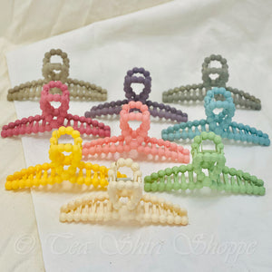 These Matte Bubble Claw Clips with a 4.25" width offers functionality and fashion in perfectly poised harmony. Perfect for fast and simple summer hairstyles, these clip are available in 10 on-trend colors – bubblegum, light sage, ivory, mulberry, sky blue, bumblebee yellow, dusty purple, latte, steel grey, ice  – that make a classic statement. Durable yet stylish, these clips will quickly become a staple in your wardrobe.