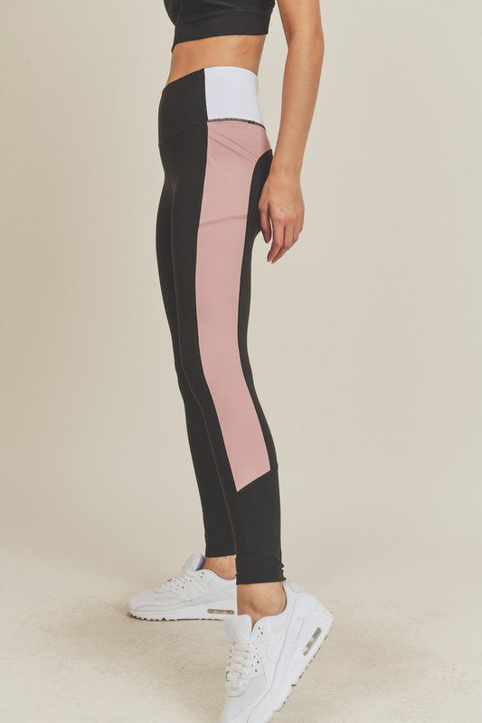 Rose Color Block Leggings Color Block Legging with Side Pockets.  Side hip pocket legging, moisture wicking fabric with soft touch and a firm hold.  Machine wash cold (Gentle cycle), Tumble dry low or Hang Dry (recommended).  Inseam  S - 26" M - 26.5" L - 27" XL - 27" Fabric Contents  75% Nylon  25% Spandex